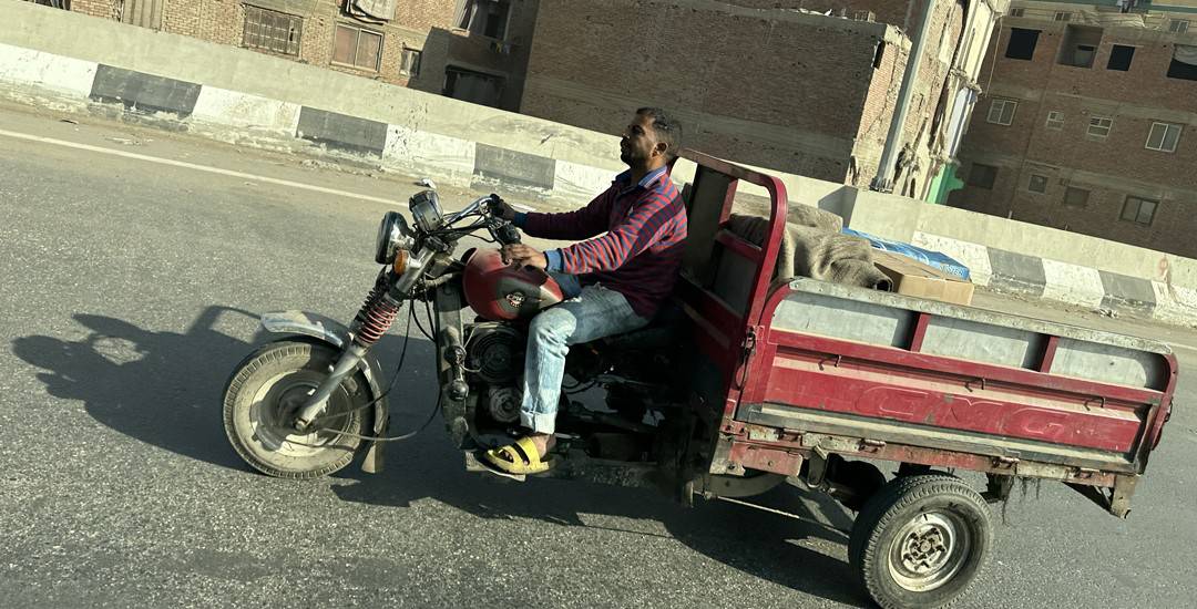 Scooters, tuk-tuks, mopeds, beasts of burden, broken cars, and busses. Everyone is seemingly on the go.